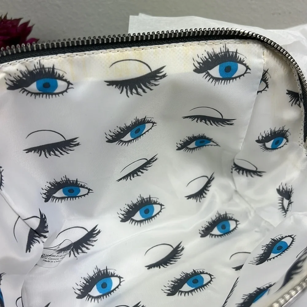 NWT Rodan + Fields Cosmetic Bag Silver with Tassel